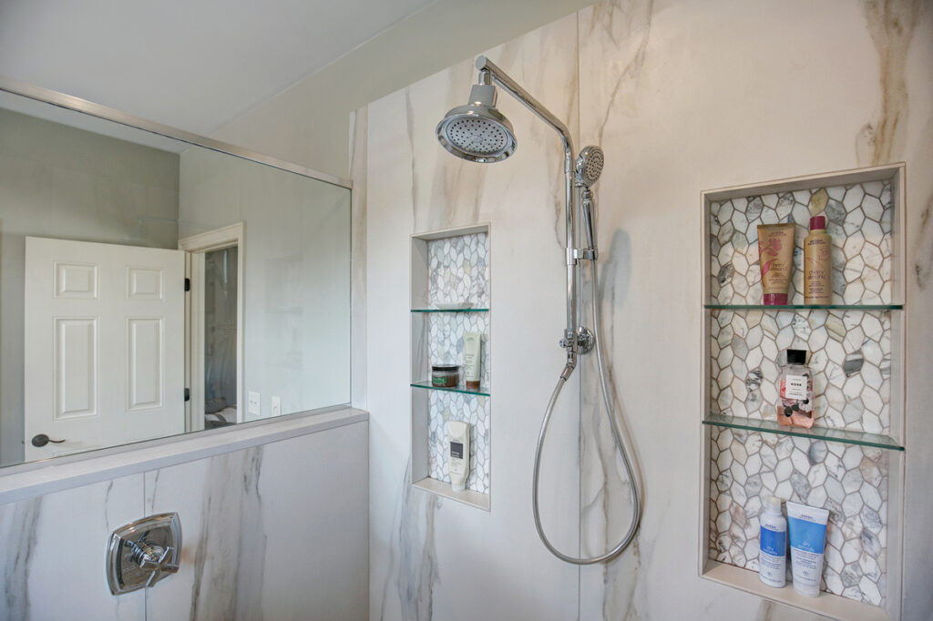 Accent bathroom tile trend in shower niche
